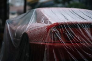wet reckless red car in the rain southern california lawyer
